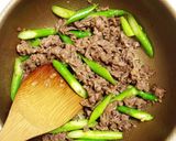 A picture of step 4 of Stir Fried Beef and Asparagus in Oyster Sauce.