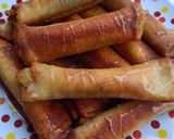 Foto langkah ke 5 dari resep Roti Gulung keju coklat simple.
