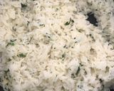 A picture of step 3 of Creamy spring onion prawns with parsley rice.
