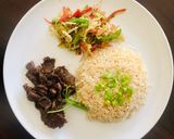 A picture of step 10 of Teppanyaki Beef, Stir Vegetables and Garlic Rice.