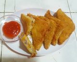 Foto langkah ke 5 dari resep Roti goreng isi ragout sayur dan ayam.