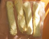 A picture of step 5 of Puff pastry hot dogs with caramelized onions.