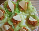 Foto del passaggio 5 della ricetta Involtini di verza con zucca e provola