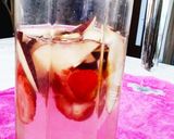 A picture of step 2 of Strawberry Apple water.
