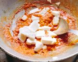 A picture of step 3 of Rich Tomato Paneer 😋😋😋.