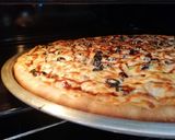 صورة لخطوة 10 من وصفة 🍕 بيتزا الفخامة محشوة الاطراف 🍕
