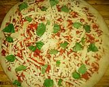 A picture of step 2 of Tex's Meat Lover's Pizza 🍕🐷🐮🐔🧀.