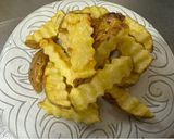 A picture of step 2 of Fried Potatoes with cheese and Japanese sauce.