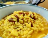 Foto del paso 8 de la receta: Arroz meloso con anillas de calamar y alga dulse