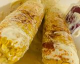 A picture of step 4 of Mexican Elotes. Corn on the cob.