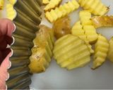 A picture of step 1 of Fried Potatoes with cheese and Japanese sauce.