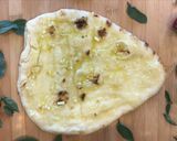 A picture of step 2 of Mango Strawberry Naan Pizza.