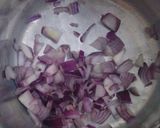 A picture of step 1 of Paprika Tomato Sukuma Wiki (kales).