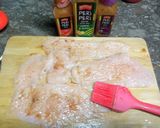 A picture of step 2 of Crispy chicken peri peri burger.