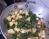 A picture of step 7 of Aloo palak.
