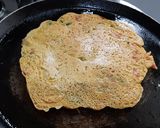 A picture of step 7 of Besan onion tomato chilla.