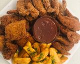 A picture of step 5 of Crunchy coconut & Panko chicken strips.