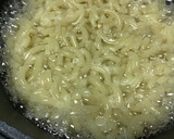 Foto del paso 4 de la receta: Chipirones flambeados al brandy con pasta