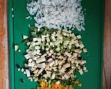 Foto del paso 3 de la receta: Arroz con vegetales y presas de pollo