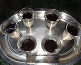 A picture of step 5 of Orange lemon posset shoters.