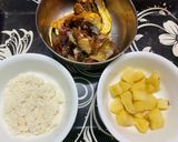 A picture of step 1 of Muri Ghonto : Fish Head curry with Gobindobhog Rice.