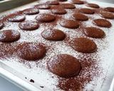 A picture of step 25 of Rich Bitter Chocolate Macarons.