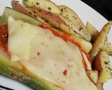 Foto del paso 7 de la receta: Zapallitos rellenos con salsa improvisada y papas rústicas 🥔🥒