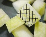 A picture of step 1 of Simmered Winter Melon, Imitation Crab and Okra.