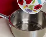 A picture of step 1 of Chocolate biscuit cake.