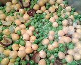 A picture of step 4 of Chickpeas and green peas.