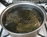 A picture of step 1 of Simmered Sesame Konbu.