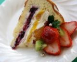 A picture of step 8 of Christmas Fruit Tiramisu Cake.