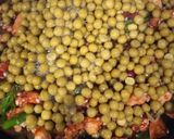 A picture of step 5 of Paella Rice with Chicken and Vegetables.