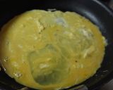 A picture of step 5 of Creamy Mentaiko Omurice.