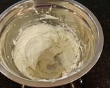 A picture of step 11 of Strawberry Cheesecake Layer Cake.