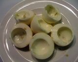 A picture of step 2 of fry deviled eggs (portuguese ovos verdes ).