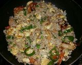 A picture of step 17 of Shrimp, Egg and Pea fried rice.