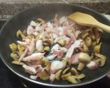 Foto del paso 6 de la receta: Salteado de pulpo con gulas y verduras