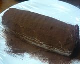 A picture of step 6 of Chocolate Cream Biscuit Cake.