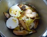 A picture of step 2 of Chinese-Style Simmered Chicken Wings and Daikon Radish with Star Anise In a Pressure Cooker.