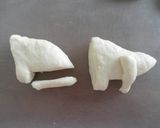 A picture of step 3 of Dinosaur Bread Triceratops.