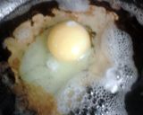 A picture of step 2 of Bacon Fried Eggs.