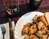 Foto del paso 8 de la receta Alitas al horno con patatas y cebolla