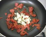A picture of step 5 of Fragrant with Garlic! Umeboshi and Tuna Aglio, Olio e Peperoncino.