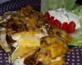 A picture of step 9 of Creamy Burrito Casserole.