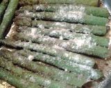 A picture of step 2 of asparagus wrapped in phyllo.