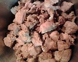 A picture of step 3 of Cabbage, pork and cauliflower, with a sauce.