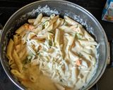 A picture of step 4 of Penne pasta in white sauce (with fresh cream and cheese).