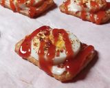 A picture of step 5 of Tuc Egg Canapes.