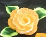A picture of step 4 of Orange cup cakes with orange flowers decorate.